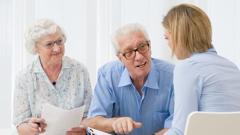 Senior couple talking about retirement plan